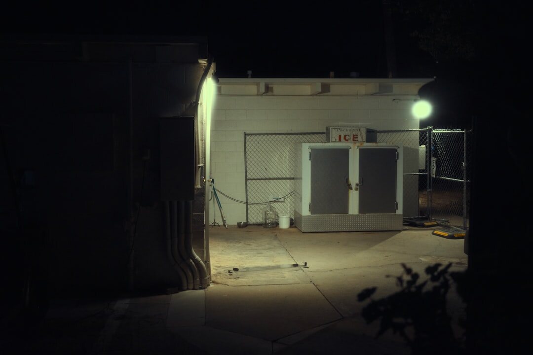 Dark television studio set with dramatic stage lighting rig