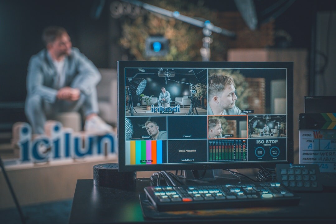 Television studio control room with multiple broadcast monitors and a vision mixer